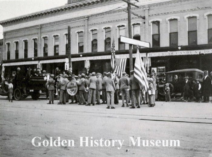 Armistice Day parade in front of the Linder Hardware building, 13th and Washington - Golden History Museum collection