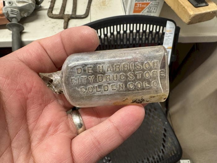 Bottle found on the Astor House grounds with embossed print saying "D. E. Harrison - City Drugstore - Golden Colo"