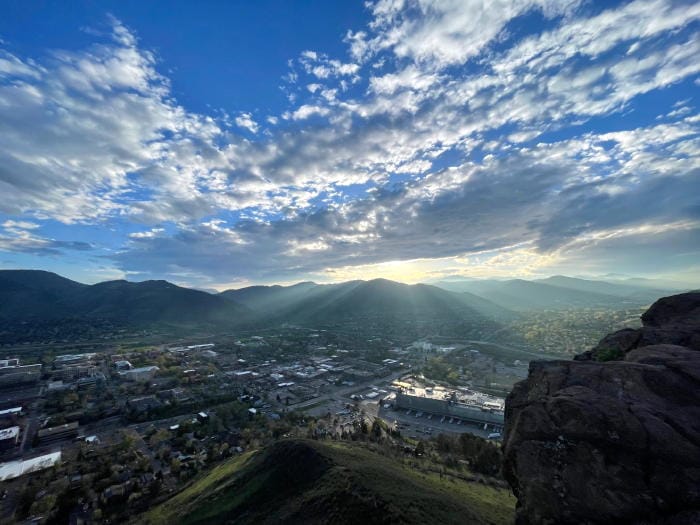 Looking north from South Table Mountain with Coors Brewery below and the sun breaking through the clouds over the foothills