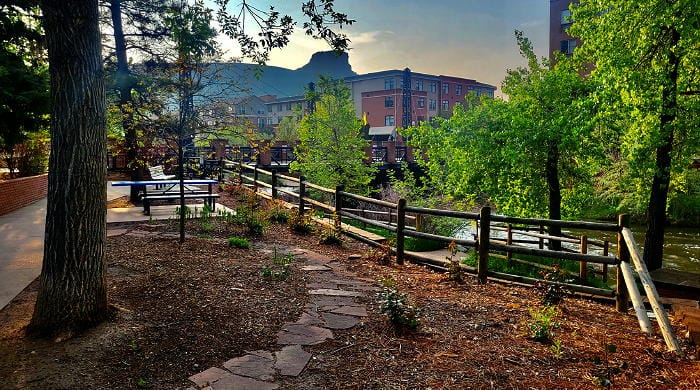 The park behind the Visitors Center, with the Washington Avenue bridge and Castle Rock in the background.