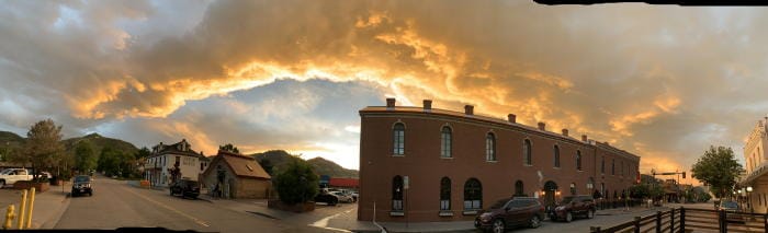 Panoramic photo showing 12th and Miners Alley, including the Loveland and Everett blocks and the Astor House