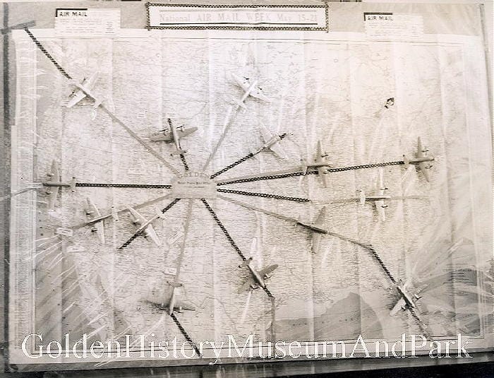 black and white photo of a map made to celebrate National Air Mail Week.  Golden is marked at the center with model airplanes radiating out from Golden.