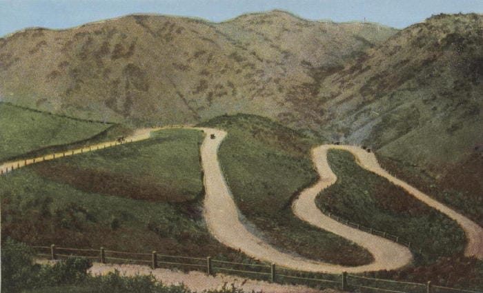 Double hairpin turns on the Lariat Trail, shown in an early promotional postcard.