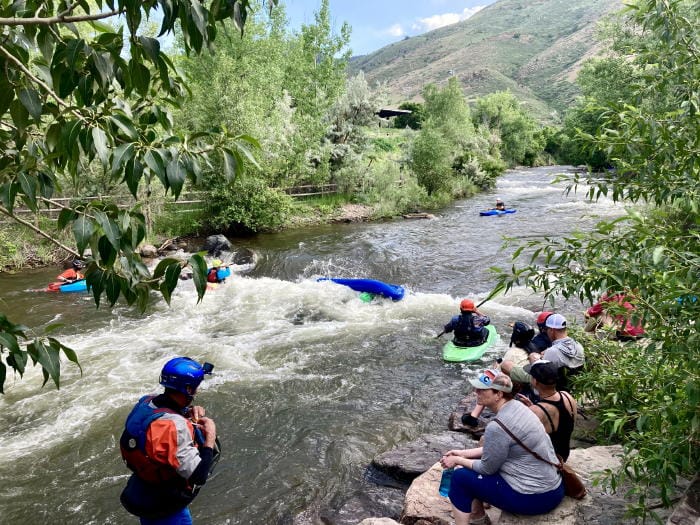 Colorado Whitewater Association Community Rodeo - Several Kayaks in Clear Creek