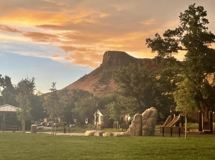 DeLong Park on 23rd Street in Golden - Castle Rock and orange clouds in the background.