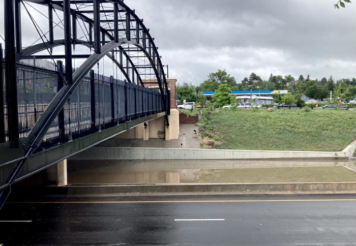 Westbound lane of Highway 58 flooded under the Washington Avenue bridge