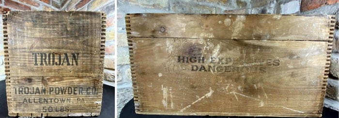 2 angles on a wood box marked "Trojan Powder Co. Allentown, PA - HIGH EXPLOSIVES DANGEROUS"