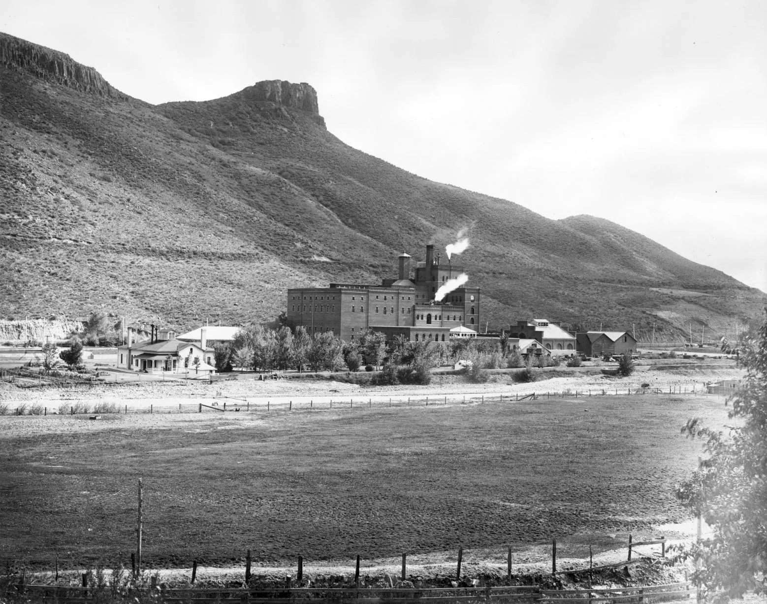 black and white image of Coors brick brewery and the Coors family home