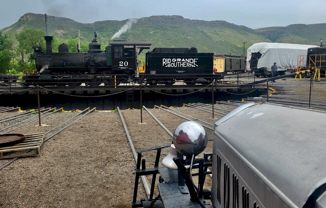 Steam locomotive #20 and coal tender saying "Rio Grande Southern" - S. Table Mountain behind