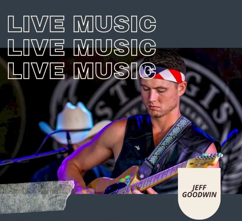 Jeff Goodwin live music - man playing guitar wearing leather vest with red white & blue bandana holding his hair back