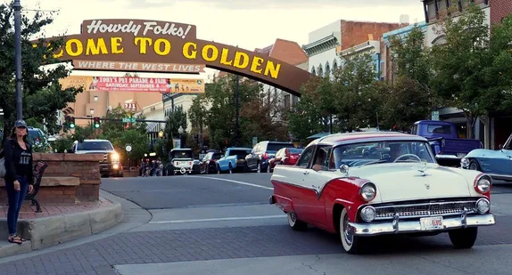 red and white '55 Chevy on Washington Avenue - Welcome arch in the background